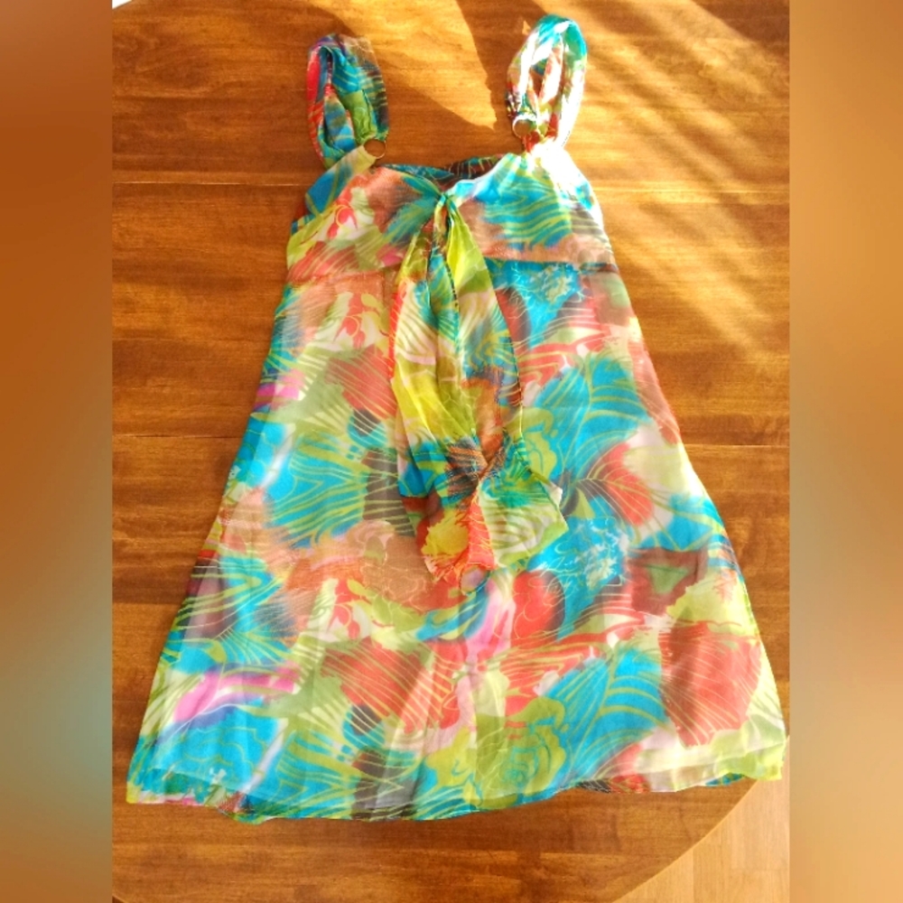 NWT Nikibiki Sheer summer dress. Size m. Crisscross back. Metal loops in front.